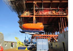This photo shows a lifeboat on the Ampelmann system right before installation.
