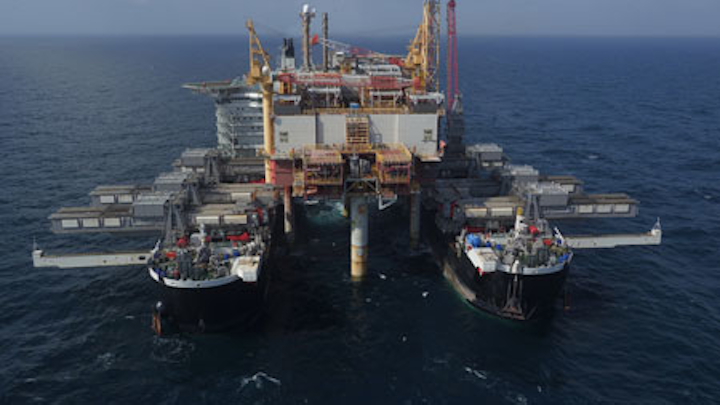 Pioneering Spirit moves in to remove the Yme MOPU