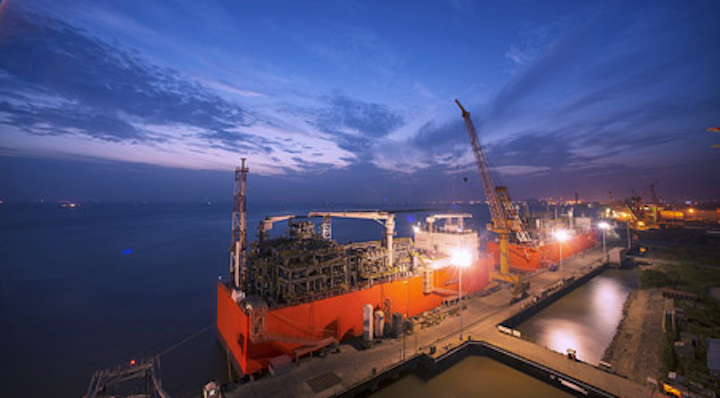 Barge-based floating storage and regasification unit