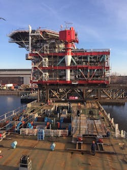 load-out of the 3,200-ton satellite platform topsides for Lukoil’s Korchagin oil field development load-out of the 3,200-ton satellite platform topsides for Lukoil’s Korchagin oil field development