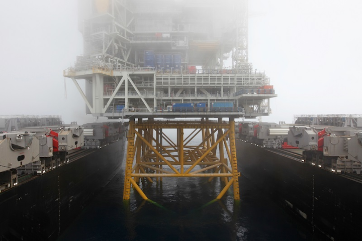 The Pioneering Spirit moving away from the Johan Sverdrup drilling platform offshore Norway