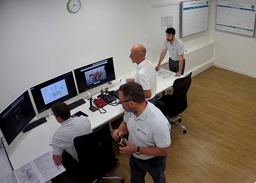 Ethos staff demonstrating an emergency scenario using the fully adaptable simulator.