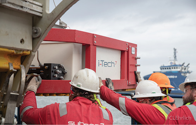 Skid being lowered into place using certified lifting points that are designed for safe, even lifts.
