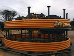 Thermoplastic composite pipeline is a non-conductive, non-corrosive flexible pipe designed for installation through a subsea pallet or from a reel on a vessel.