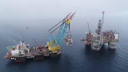 The Saipem 7000 lifting the 3,500-metric ton Dvalin gas processing/compression module onto the Equinor-operated Heidrun platform in the Norwegian Sea.