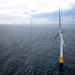 Hywind floating wind turbines withe the Snorre A semisubmersible platform in the distance.