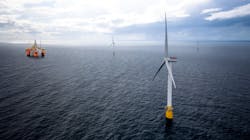 Hywind floating wind turbines withe the Snorre A semisubmersible platform in the distance. Hywind floating wind turbines withe the Snorre A semisubmersible platform in the distance.