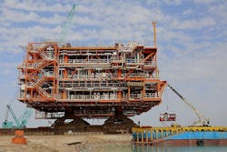 The South Pars Phase 13 platform was loaded on a FLB124 barge using a ‘push/pull’ method. The South Pars Phase 13 platform was loaded on a FLB124 barge using a ‘push/pull’ method.