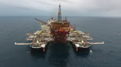 The Pioneering Spirit lifting the Brent Alpha topsides.