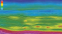 A full MAZ stack seismic section of the final PSDM processing with a partial velocity overlay, showing detailed polygonal faulting in the Paleocene section and improved reflection continuity at all levels. PGS data: GeoStreamer X Viking Graben 2019