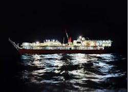 Night view of the production barge Ingenium II at the Apsara oil field development offshore Cambodia.