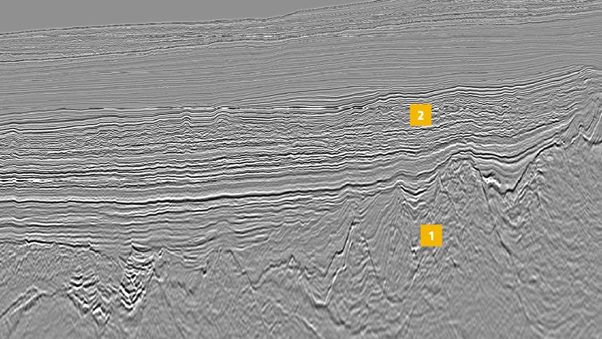 A final PSDM full-stack line from the NAM 2019 3D GeoStreamer survey offers imaging of (1) deep structuration and basin fill, and (2) thick prognosed clastic fairway identified in potential structural and stratigraphic trapping configurations.