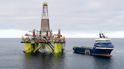 The Norwegian offshore supply vessel Normand Skude services a COSL oil drilling rig in the Kara Sea.