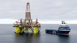 The Norwegian offshore supply vessel Normand Skude services a COSL oil drilling rig in the Kara Sea. The Norwegian offshore supply vessel Normand Skude services a COSL oil drilling rig in the Kara Sea.