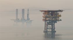 Fog settles at an oil field in the Persian Gulf.