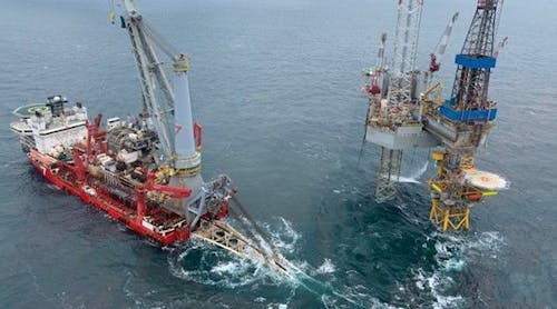 An aerial view of Subsea 7&apos;s Seven Borealis vessel lays the Southwark end of the 6-km extension of the Saturn Banks Pipeline System earlier this month, while drilling continues at Southwark.