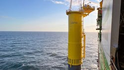 The first foundation is shown being lowered at the Dogger Bank Wind Farm. The first foundation is shown being lowered at the Dogger Bank Wind Farm.