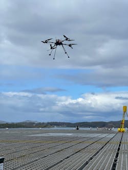 A Nordic Unmanned logistics drone prepares to land on a helideck. A Nordic Unmanned logistics drone prepares to land on a helideck.