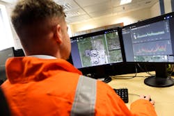 A Project Canary employee carries our continuous emissions monitoring in real time. A Project Canary employee carries our continuous emissions monitoring in real time.