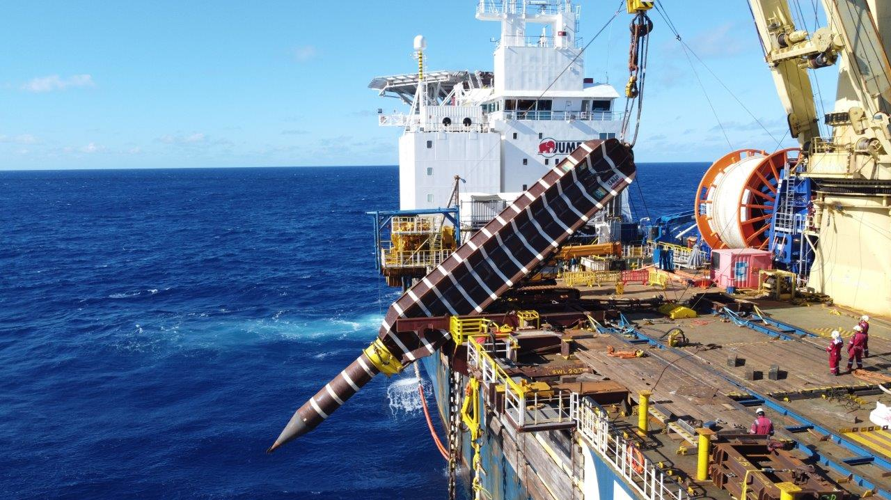 Fairplayer overboarding torpedo pile for FPSO mooring system
