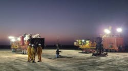 Crews prepare surface equipment for well abandonment. Crews prepare surface equipment for well abandonment.