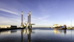 Jackup drilling rig in Esbjerg harbor, Denmark. Jackup drilling rig in Esbjerg harbor, Denmark.