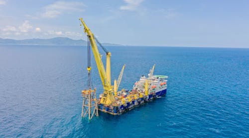 A platform jacket in the Gulf of Thailand is pictured being towed to the reef site.