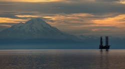 An oil and gas platform operates in the Cook Inlet offshore Alaska. An oil and gas platform operates in the Cook Inlet offshore Alaska.