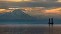 An oil and gas platform operates in the Cook Inlet offshore Alaska. An oil and gas platform operates in the Cook Inlet offshore Alaska.