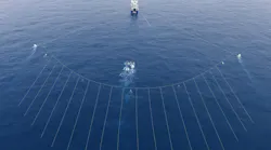 An aerial view of a P-Cable spread shows the compact spread dimensions and closely spaced streamers. For this configuration, there are 18 100-m-long streamers separated by 12.5 m in the crossline for a total spread width slightly over 200 m. Photo courtesy of NCS SubSea, which has been acquired by Ocean Floor Geophysics Inc.