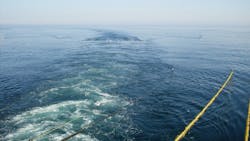 Seismic cables are distributed from an industrial oil and gas research vessel. Seismic cables are distributed from an industrial oil and gas research vessel.