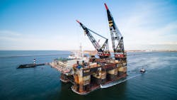 Thialf is capable of a tandem lift of 14,200 metric tons. Thialf is capable of a tandem lift of 14,200 metric tons.