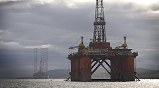 Offshore rigs anchored on a fjord near Invergordon, Scotland.