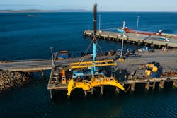Mocean Energy's Blue X is lifted into the water at Hatston Pier. Mocean Energy's Blue X is lifted into the water at Hatston Pier.