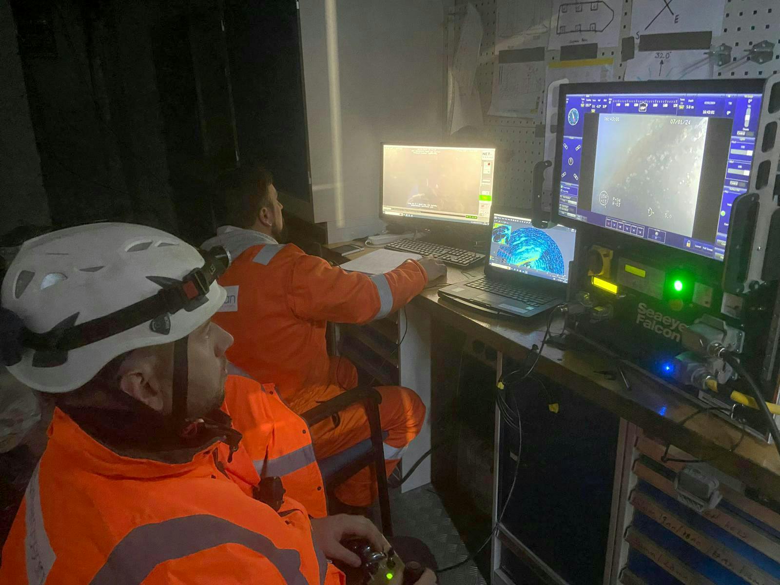 The ROV pilot and inspection coordinator performs an inspection of submerged structures. The system allows the inspector to independently assess the data in real time, while all dive footage is recorded allowing post-inspection data analysis to be performed.