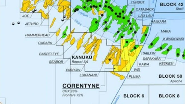 On the map, green represents oil discoveries, orange areas represent prospects and the yellow region is a CGX/Frontera block. Solid black dots are well locations, while half-filled dots are oil show wells.