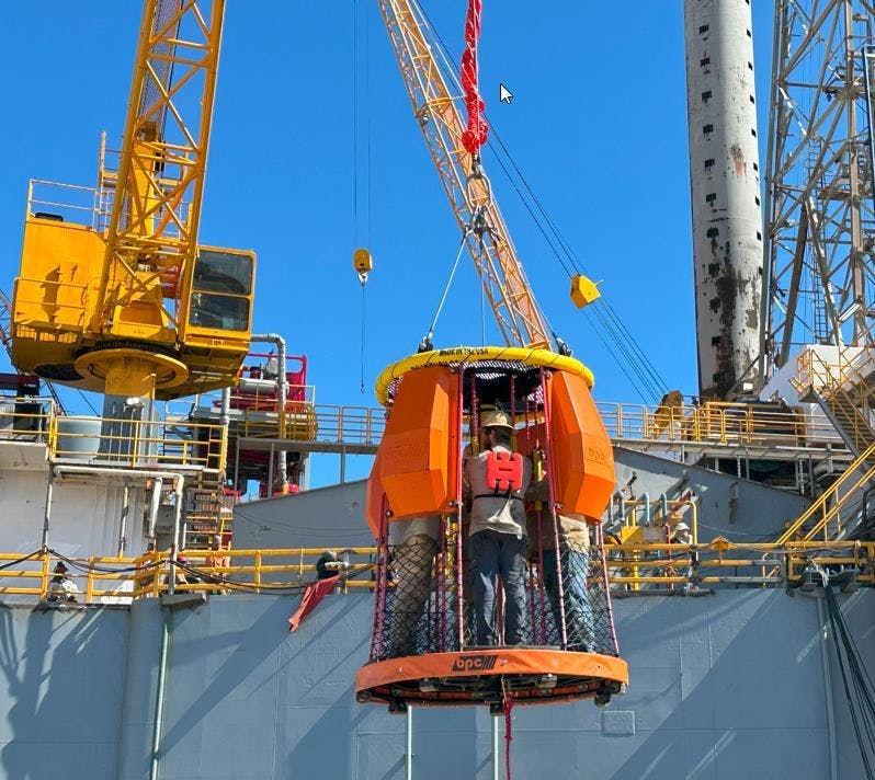 The X-1000 personnel transfer device's flotation modules have been added to the upper section of the grablines and top frame to incorporate self-righting floatation without impeding rider egress. The X-1000 personnel transfer device's flotation modules have been added to the upper section of the grablines and top frame to incorporate self-righting floatation without impeding rider egress.