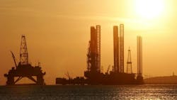 Offshore rigs semi and jackup at sundown Offshore rigs semi and jackup at sundown