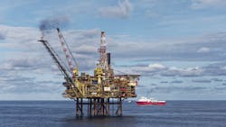 The Eagle Explorer seismic vessel passes by the Gannet A oil platform in the Gannet field of the UK North Sea. The Eagle Explorer seismic vessel passes by the Gannet A oil platform in the Gannet field of the UK North Sea.