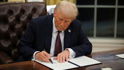 Trump signs orders Trump signs orders