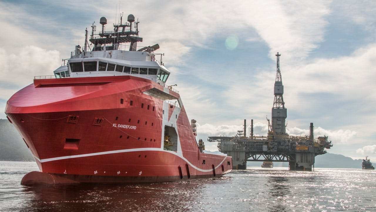 Njord A platform is shown being towed to Kværner Stord