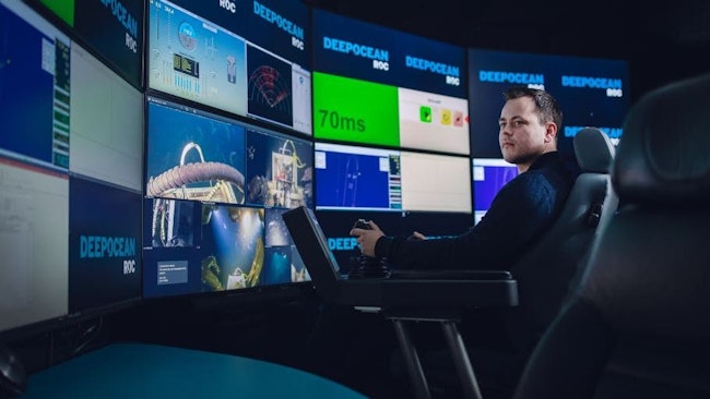 An operator manages remote subsea operations from land