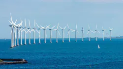 A stock art image of offshore wind turbines A stock art image of offshore wind turbines