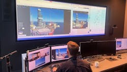 Inspection engineer pilots drone from operation room in Stavanger Inspection engineer pilots drone from operation room in Stavanger