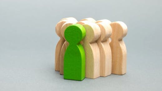 Concept art - wooden blocks with a single green leader block