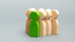 Concept art - wooden blocks with a single green leader block Concept art - wooden blocks with a single green leader block