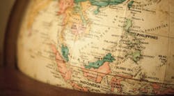 South China Sea reflected on world globe South China Sea reflected on world globe