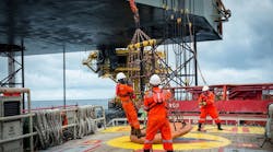 Personnel basket transfer from supply boat to offshore oil and gas rig. Personnel basket transfer from supply boat to offshore oil and gas rig.