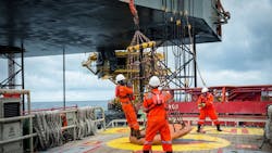 Personnel basket transfer from supply boat to offshore oil and gas rig. Personnel basket transfer from supply boat to offshore oil and gas rig.