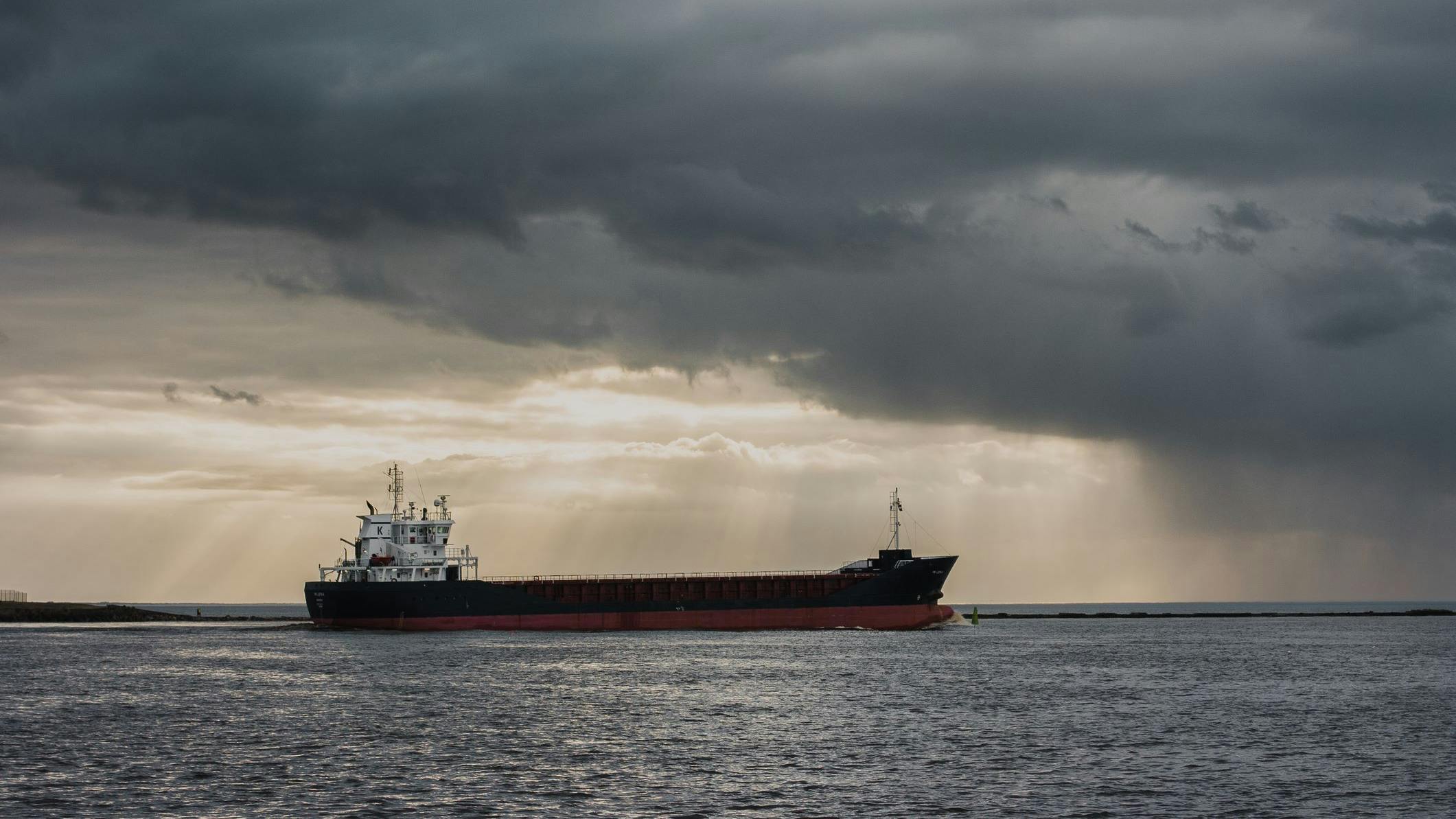 A tanker sails across the sea.
